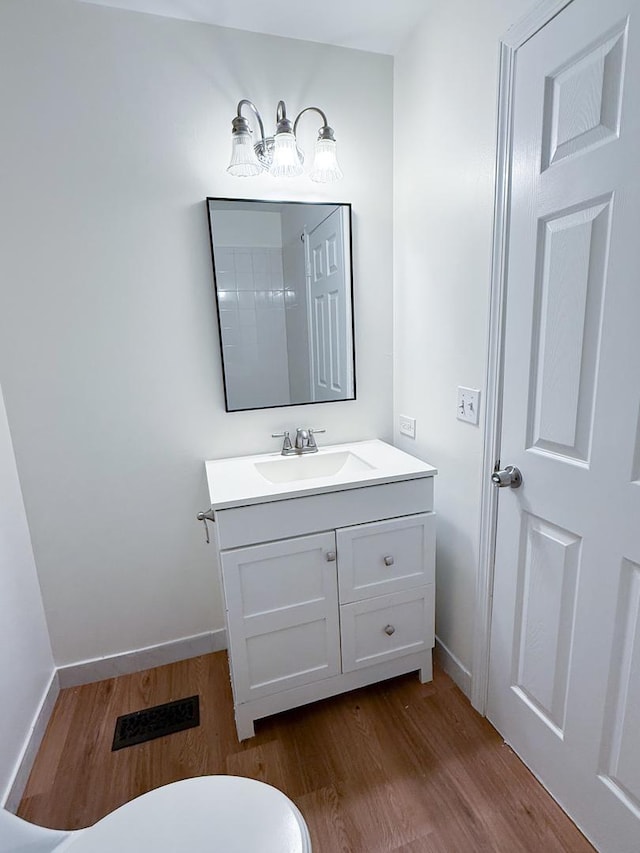 4640 Calvert Dr Unit B1, Rolling Meadows, IL 60008 - bathroom with wood finished floors and vanity