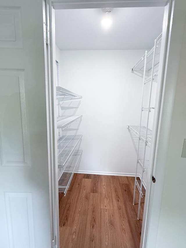 4640 Calvert Dr Unit B1, Rolling Meadows, IL 60008 - spacious closet featuring wood finished floors