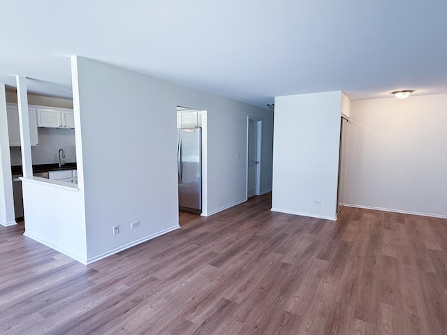 4640 Calvert Dr Unit B1, Rolling Meadows, IL 60008 - spare room featuring wood finished floors and baseboards