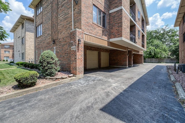 9805 Ridgeland Ave, Oak Lawn, IL 60453 - view of home's exterior featuring brick siding and an attached garage