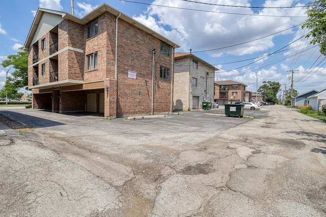 9805 Ridgeland Ave, Oak Lawn, IL 60453 - view of building exterior with covered and uncovered parking