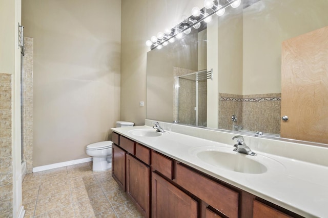 1740 N Maplewood Ave Unit 218, Chicago, IL 60647 - full bathroom featuring double vanity, a shower stall, and tile patterned flooring