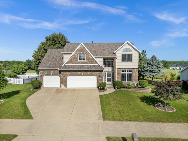 2913 Fox Creek Rd, Bloomington, IL 61705 - traditional-style home with driveway, brick siding, and roof with shingles