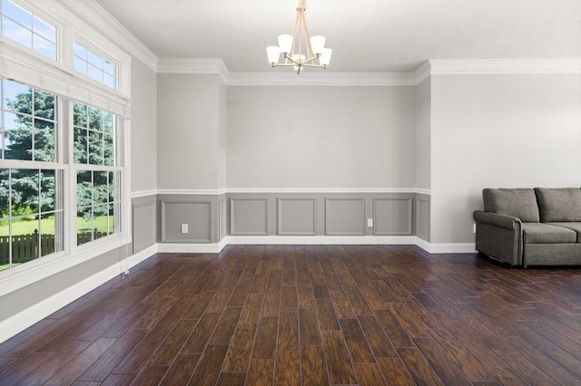 2913 Fox Creek Rd, Bloomington, IL 61705 - empty room with a chandelier, dark wood finished floors, and ornamental molding