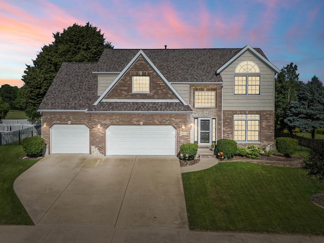 2913 Fox Creek Rd, Bloomington, IL 61705 - traditional-style home featuring concrete driveway, brick siding, roof with shingles, and an attached garage