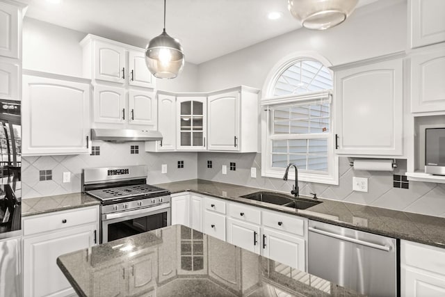 2913 Fox Creek Rd, Bloomington, IL 61705 - kitchen featuring stainless steel appliances, under cabinet range hood, white cabinets, pendant lighting, and recessed lighting