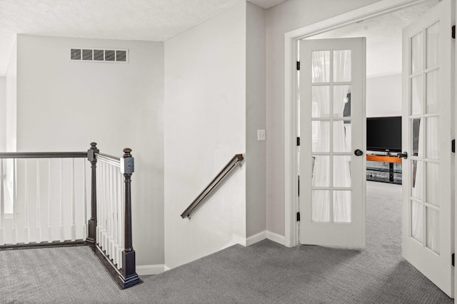 2913 Fox Creek Rd, Bloomington, IL 61705 - staircase featuring carpet floors and french doors