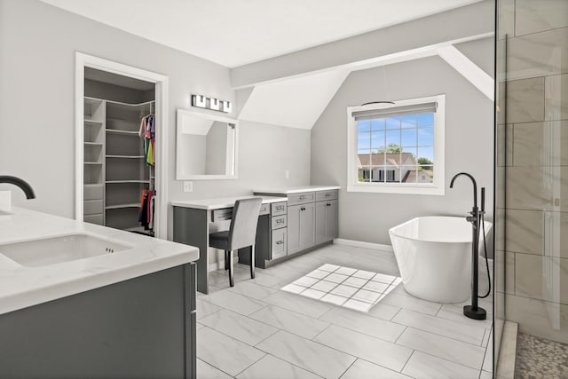 2913 Fox Creek Rd, Bloomington, IL 61705 - full bath featuring vanity, marble finish floors, a soaking tub, a tile shower, and vaulted ceiling