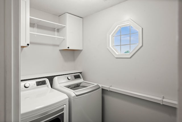 2913 Fox Creek Rd, Bloomington, IL 61705 - washroom featuring washer and clothes dryer and cabinet space