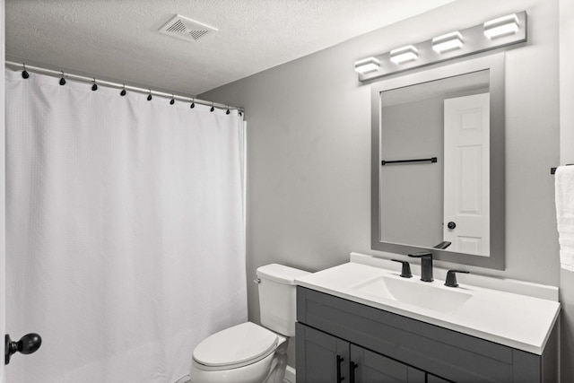 2913 Fox Creek Rd, Bloomington, IL 61705 - bathroom with vanity, a textured ceiling, and curtained shower
