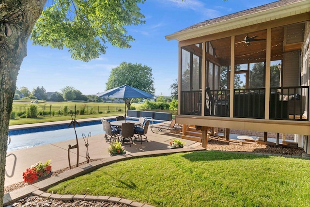 2913 Fox Creek Rd, Bloomington, IL 61705 - view of patio featuring a sunroom and a ceiling fan
