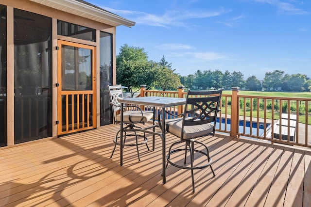 2913 Fox Creek Rd, Bloomington, IL 61705 - wooden terrace featuring a sunroom