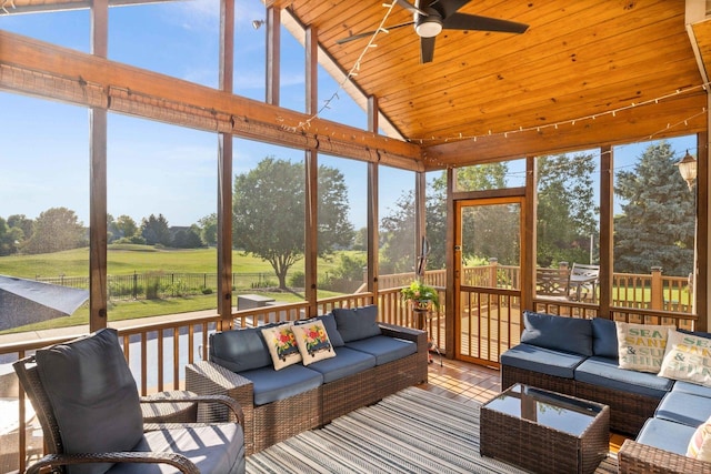 2913 Fox Creek Rd, Bloomington, IL 61705 - sunroom / solarium featuring an outdoor hangout area, a ceiling fan, vaulted ceiling, and plenty of natural light
