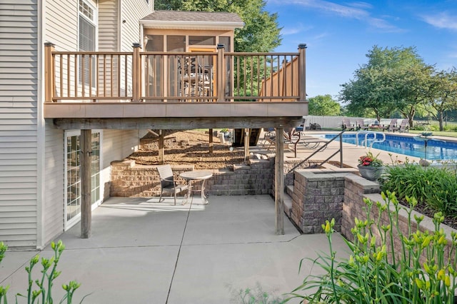 2913 Fox Creek Rd, Bloomington, IL 61705 - view of patio featuring a wooden deck and a sunroom