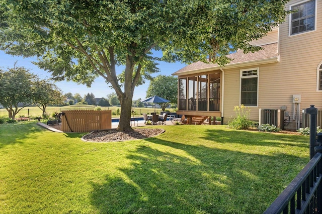 2913 Fox Creek Rd, Bloomington, IL 61705 - fenced backyard featuring a sunroom