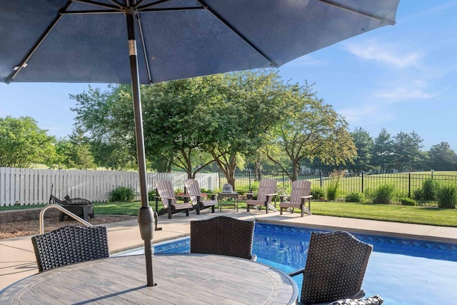 2913 Fox Creek Rd, Bloomington, IL 61705 - view of swimming pool with outdoor dining space, a fenced backyard, and a patio