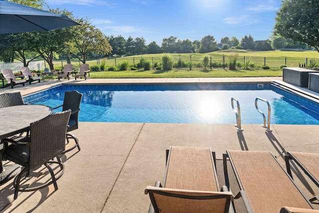 2913 Fox Creek Rd, Bloomington, IL 61705 - view of pool featuring a patio area, a fenced backyard, and outdoor dining area