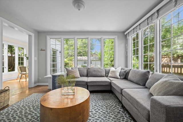 1726 Walnut Ave, Wilmette, IL 60091 - sunroom / solarium with healthy amount of natural light, wood finished floors, and french doors