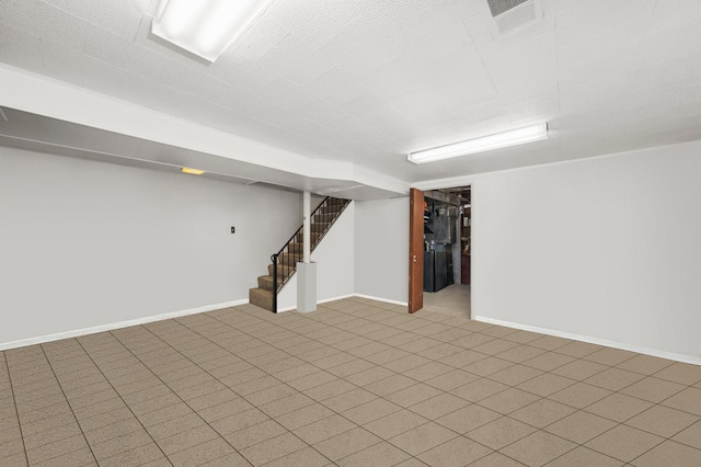 8827 N Washington St Unit B, Niles, IL 60714 - finished below grade area with stairway and baseboards