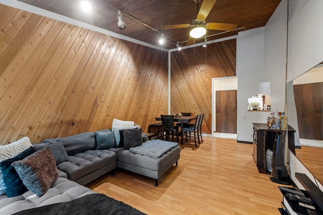 14505 Central Ct Unit Ph4, Oak Forest, IL 60452 - living area featuring track lighting, ceiling fan, wood walls, a high ceiling, and wood ceiling