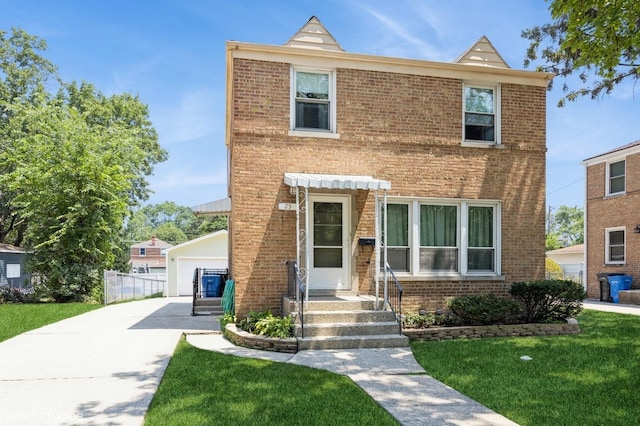 25 N Ashbel Ave, Hillside, IL 60162 - view of front of house featuring brick siding, an outbuilding, a front lawn, and a garage