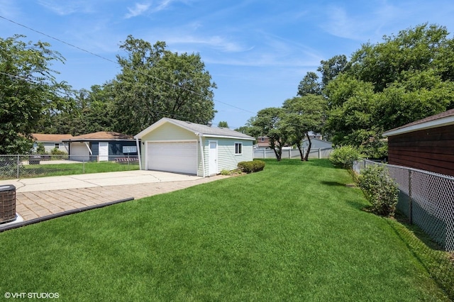 25 N Ashbel Ave, Hillside, IL 60162 - view of yard featuring a garage and an outdoor structure