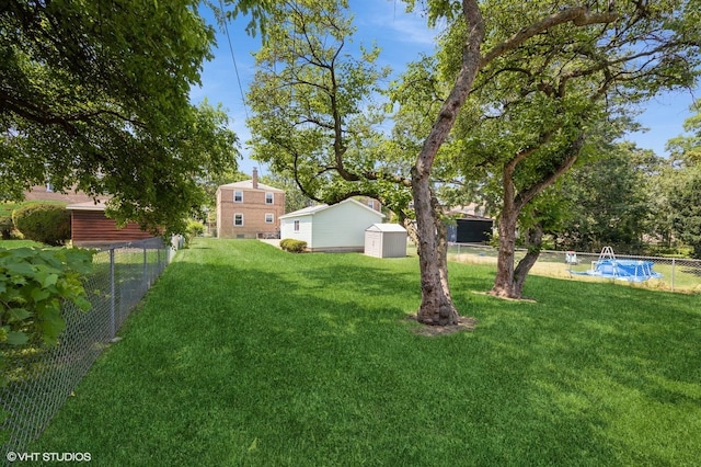 25 N Ashbel Ave, Hillside, IL 60162 - fenced backyard featuring a shed