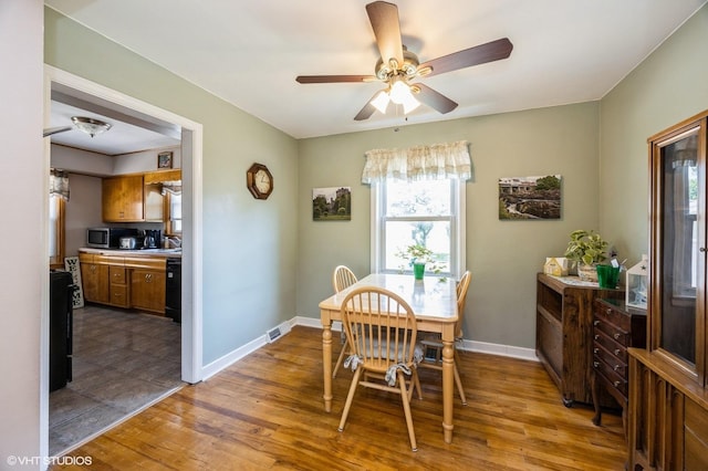 25 N Ashbel Ave, Hillside, IL 60162 - dining room featuring a ceiling fan and wood finished floors