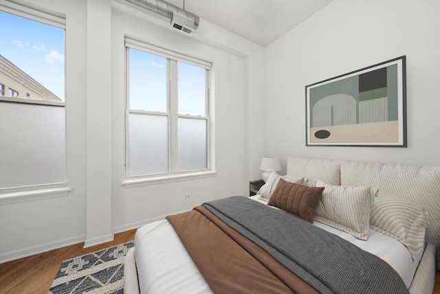 1645 W School St Unit 318, Chicago, IL 60657 - bedroom with wood finished floors and baseboards