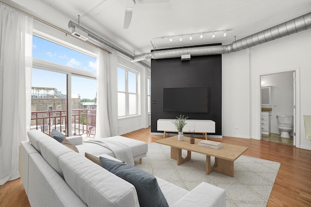 1645 W School St Unit 318, Chicago, IL 60657 - living room with a ceiling fan and wood finished floors