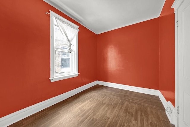 5322 W 22nd Pl, Cicero, IL 60804 - unfurnished room with wood finished floors and crown molding