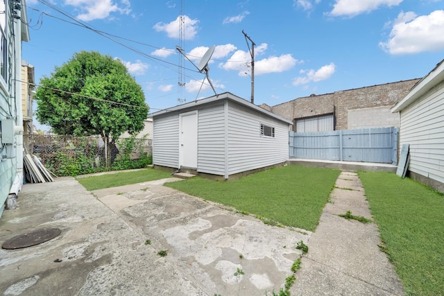 5322 W 22nd Pl, Cicero, IL 60804 - fenced backyard featuring an outdoor structure and a patio area
