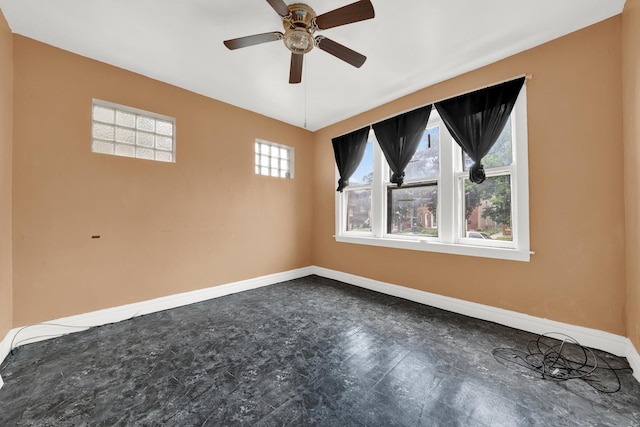 5322 W 22nd Pl, Cicero, IL 60804 - empty room with baseboards and a ceiling fan
