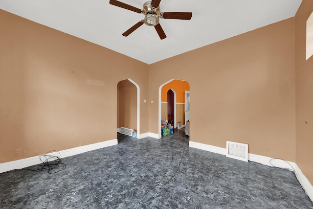 5322 W 22nd Pl, Cicero, IL 60804 - spare room featuring arched walkways and ceiling fan