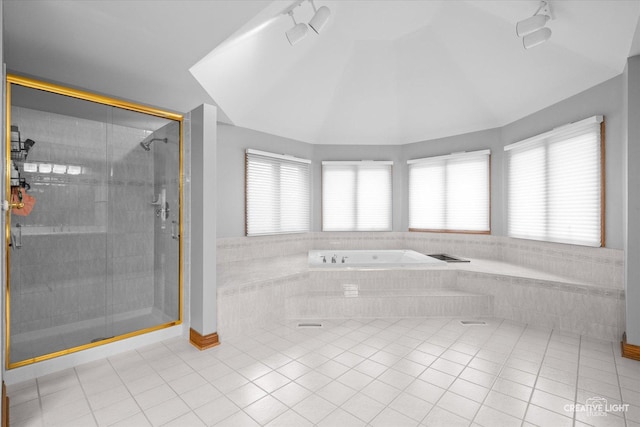 4211 Legend Ct, Naperville, IL 60564 - full bath featuring tile patterned floors, tiled bath, lofted ceiling, and healthy amount of natural light