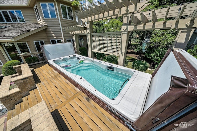 4211 Legend Ct, Naperville, IL 60564 - view of pool with a covered hot tub, a pergola, and a wooden deck