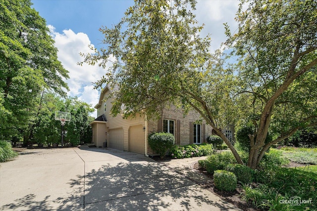 4211 Legend Ct, Naperville, IL 60564 - view of front of home with brick siding, driveway, and an attached garage