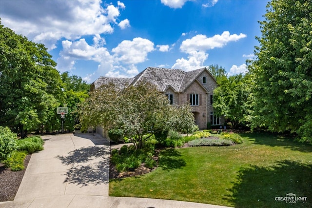 4211 Legend Ct, Naperville, IL 60564 - view of front of home featuring concrete driveway, a front yard, and a garage