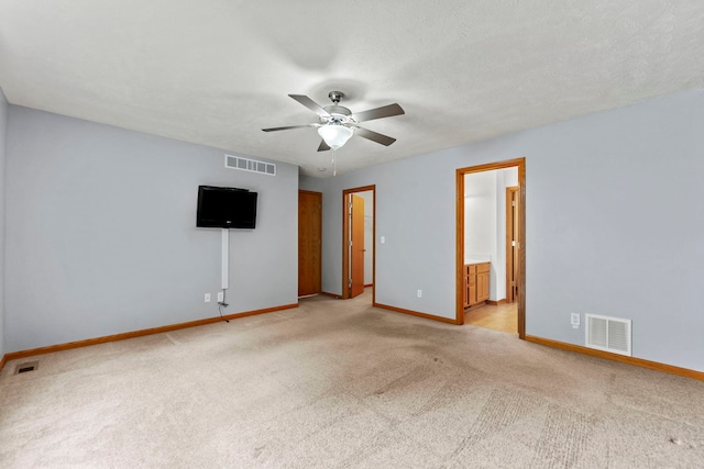 10578 Harrison Ct, Roscoe, IL 61073 - unfurnished bedroom featuring light colored carpet, ceiling fan, and ensuite bath