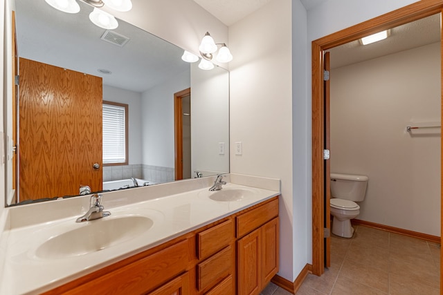 10578 Harrison Ct, Roscoe, IL 61073 - bathroom featuring double vanity, a bath, and tile patterned flooring