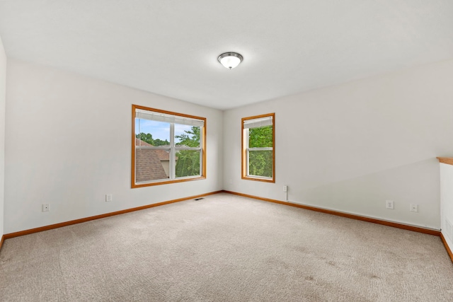 10578 Harrison Ct, Roscoe, IL 61073 - carpeted spare room with baseboards