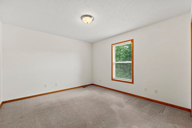 10578 Harrison Ct, Roscoe, IL 61073 - carpeted spare room with baseboards