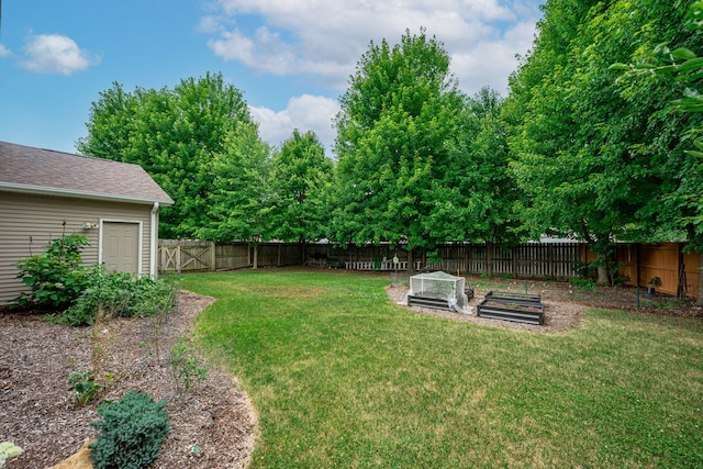 10578 Harrison Ct, Roscoe, IL 61073 - fenced backyard featuring a vegetable garden