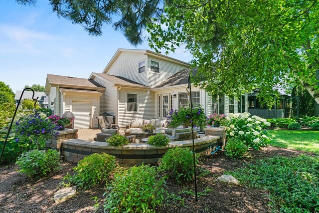 1120 Bennington Dr, Crystal Lake, IL 60014 - back of property with a patio area and an outdoor hangout area