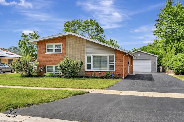 7027 174th Pl, Tinley Park, IL 60477 - tri-level home with brick siding, a front yard, an outdoor structure, and a garage