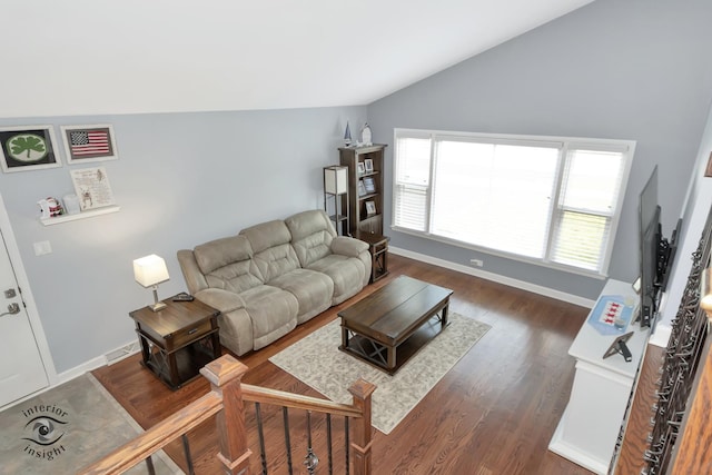 7027 174th Pl, Tinley Park, IL 60477 - living area with lofted ceiling and dark wood-style flooring