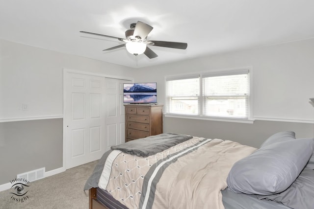 7027 174th Pl, Tinley Park, IL 60477 - bedroom with carpet floors, a closet, and a ceiling fan