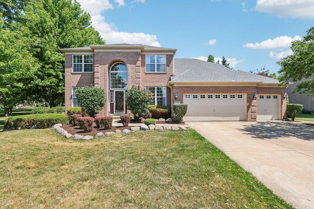1271 Mcdole Dr, Sugar Grove, IL 60554 - view of front of house with brick siding, an attached garage, a front yard, and concrete driveway