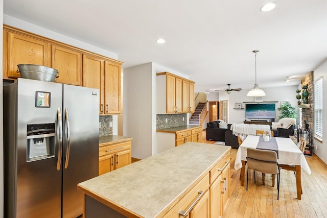 1271 Mcdole Dr, Sugar Grove, IL 60554 - kitchen featuring stainless steel fridge with ice dispenser, open floor plan, recessed lighting, tasteful backsplash, and light wood-style flooring