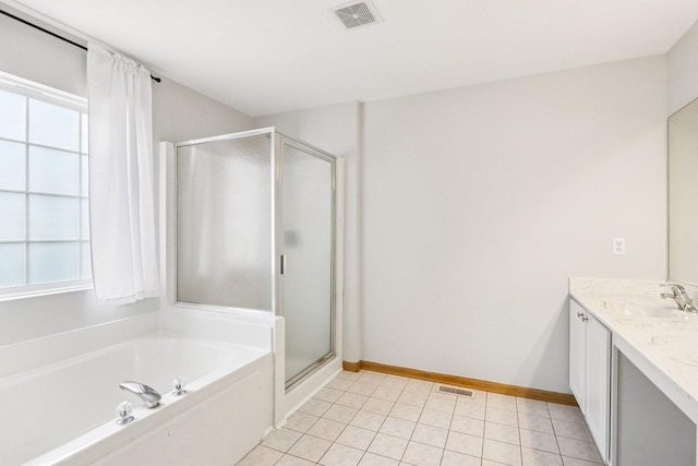 1271 Mcdole Dr, Sugar Grove, IL 60554 - bathroom with vanity, a stall shower, a bath, and tile patterned floors